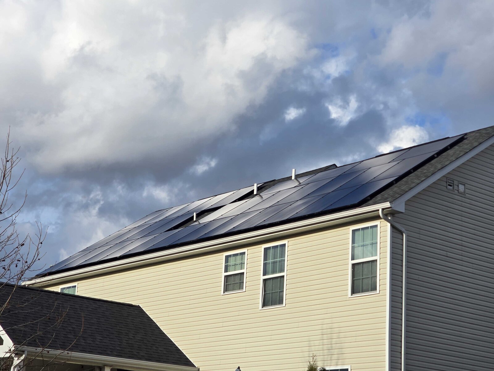 Two-story home with rooftop solar panels